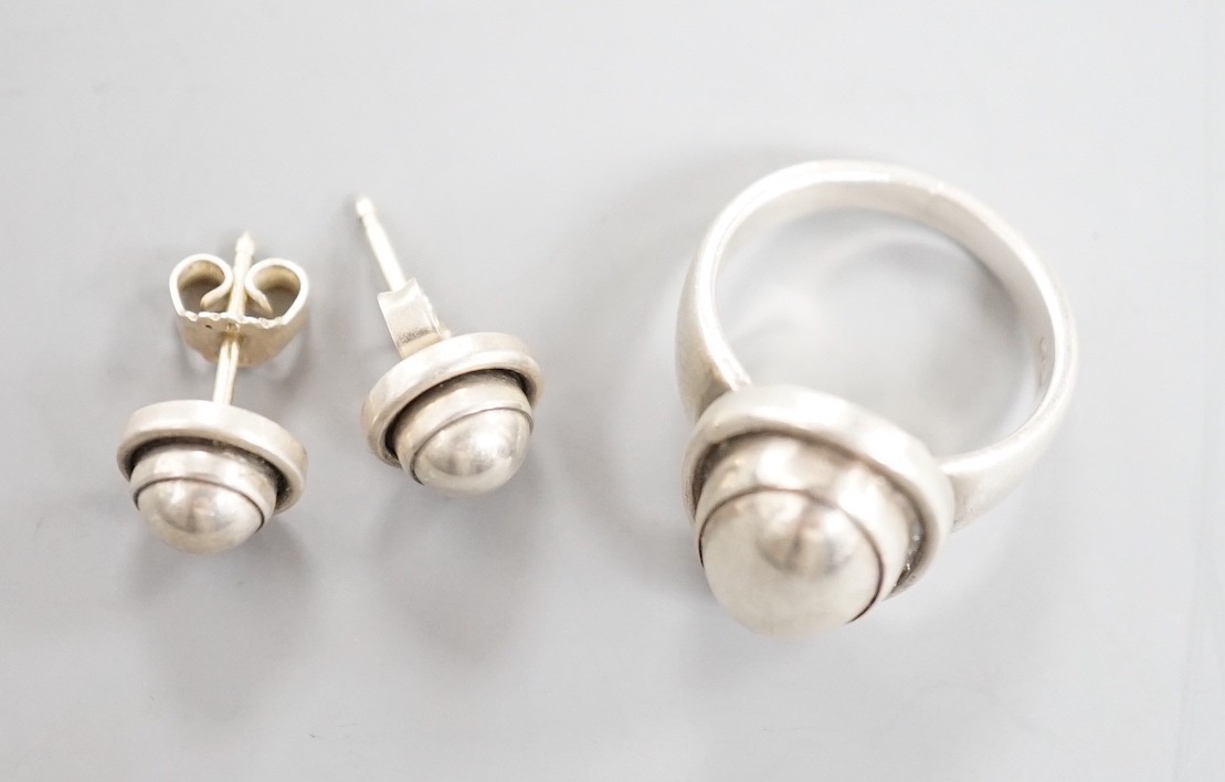 A Georg Jensen sterling 925 ring, no. 46B, size K/L and a pair of similar earrings, no.8.